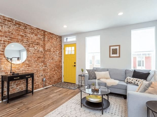 row home exposed brick wall in baltimore